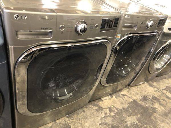 LG LARGE CAPACITY WASHER AND DRYER SET in Graphite Steel - New 4 Less Appliances
